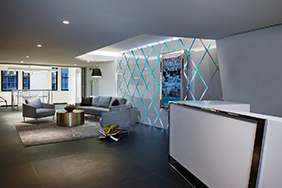 University Reception - white-reception-desk-with-metal-trim